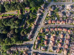 Aerial photo of the UK town known as Pontefract, located in Wakefield West Yorkshire, showing typical British housing estates with roads and paths.